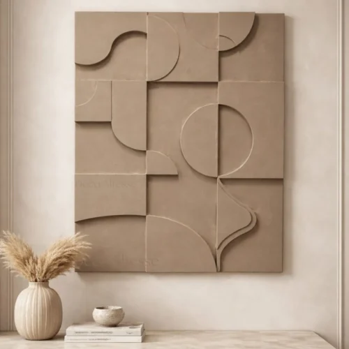 Tableau Art 3D géometrique en relief sur un mur blanc au style bohème chic avec détails soignés et couleurs neutres.